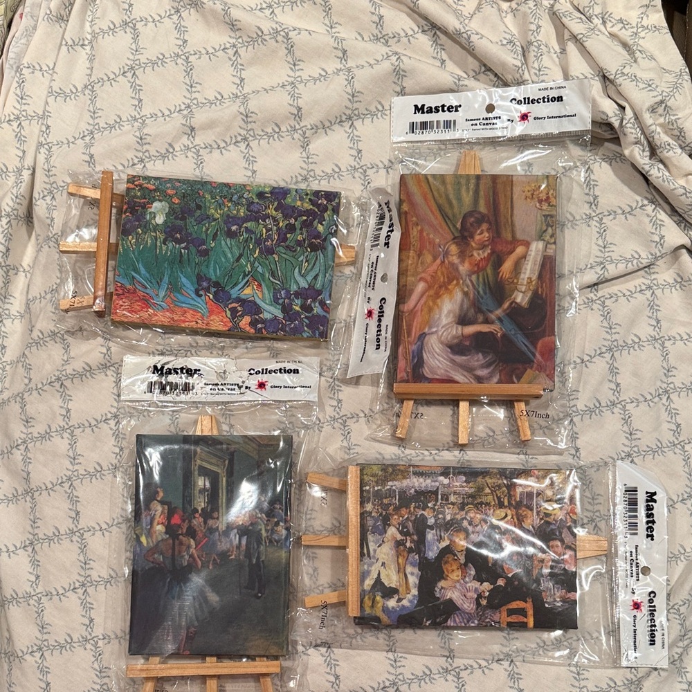 New in packaging - set of 4 Famous Artists on Canvas